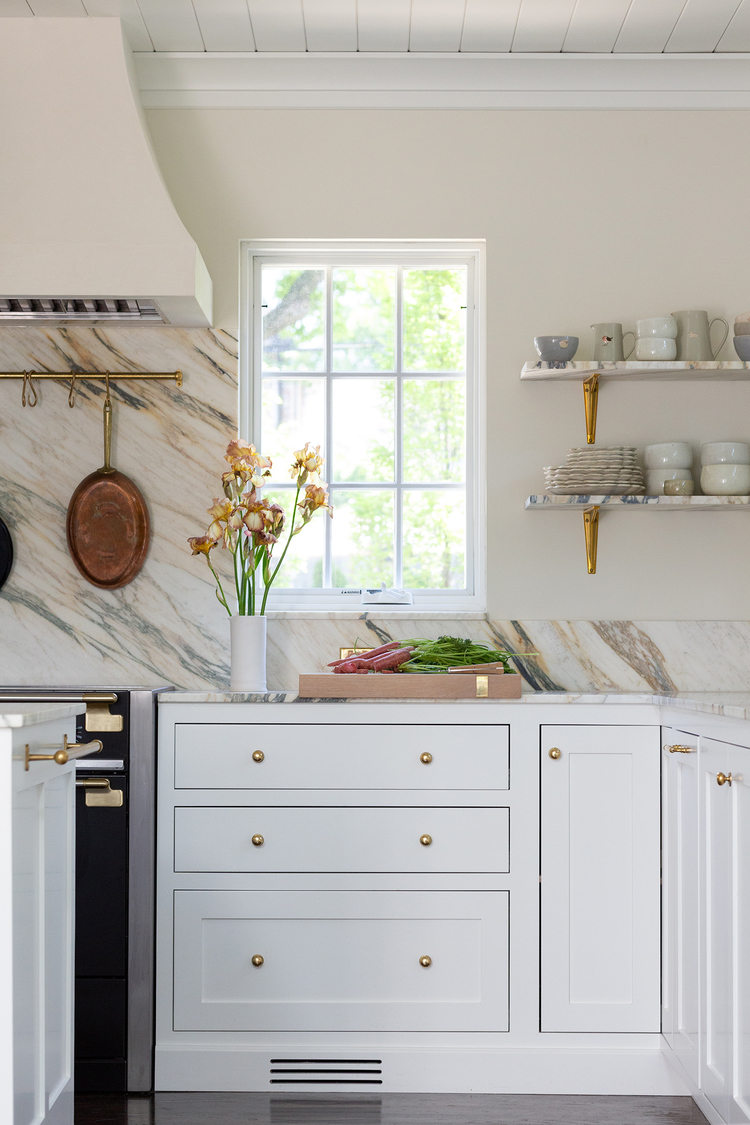 Second half of the range elevation highlighting the natural stone backsplash and open shelving.